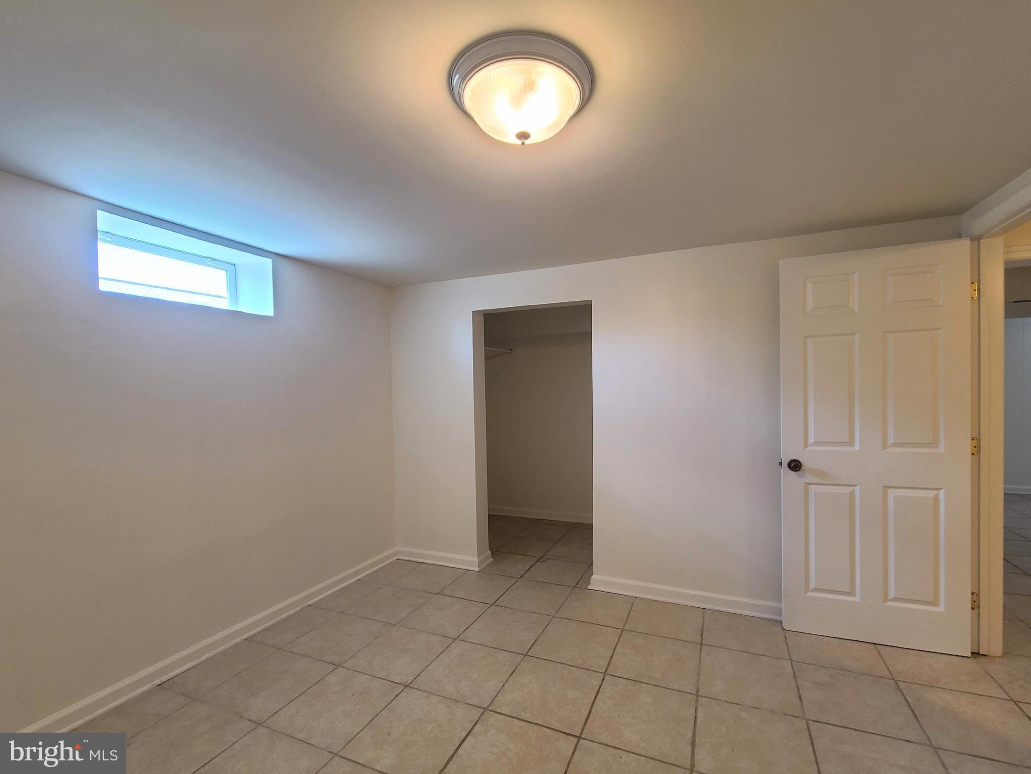 204 Mt Pleasant Boulevard Fredericksburg, VA 22405 - Photo 27 of 30 an empty room with a fan & a window