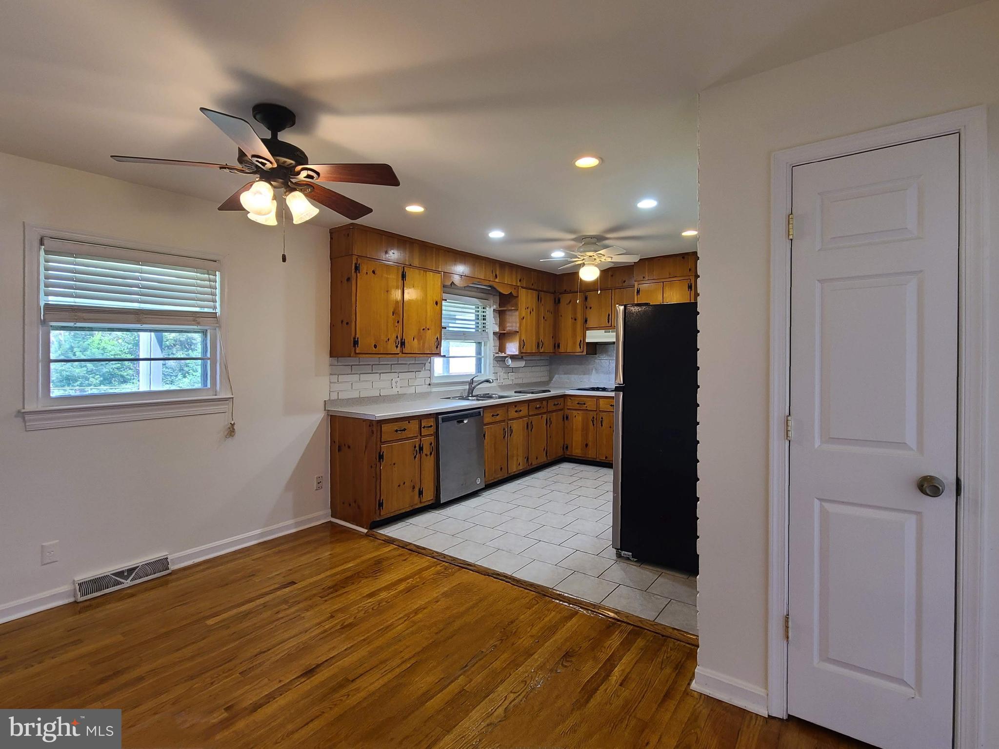 204 Mt Pleasant Boulevard Fredericksburg, VA 22405 - Photo 5 of 30 a large kitchen with kitchen island a sink stainless steel appliances and cabinets