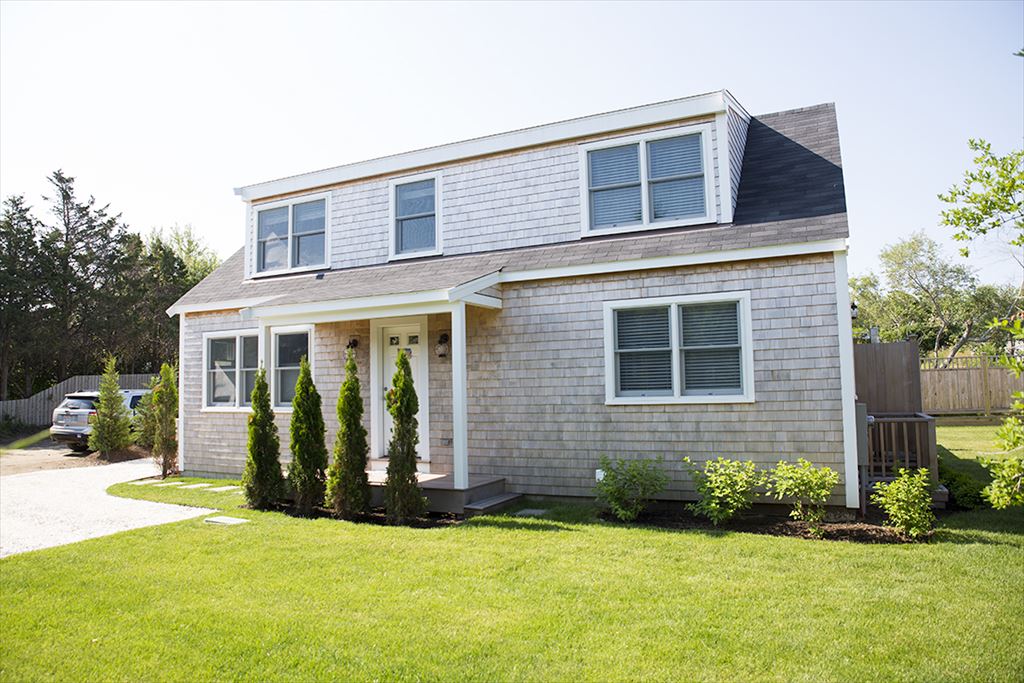 10 Pilgrim Road Nantucket, MA 02554 - Photo 59 of 65 a front view of house with yard and green space
