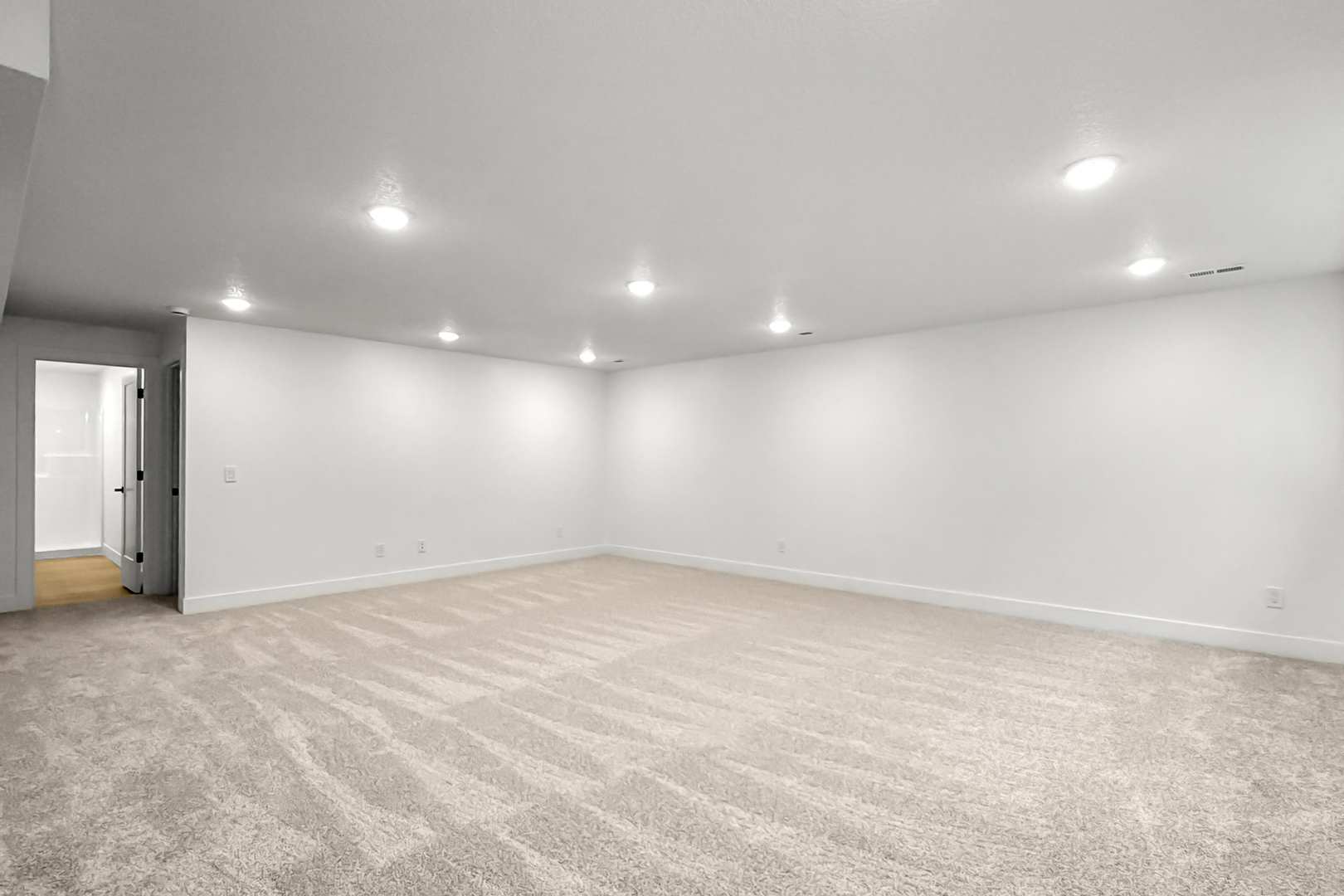 606 Kevin Road Blue Grass, IA 52726 - Photo 12 of 33 an empty room with window