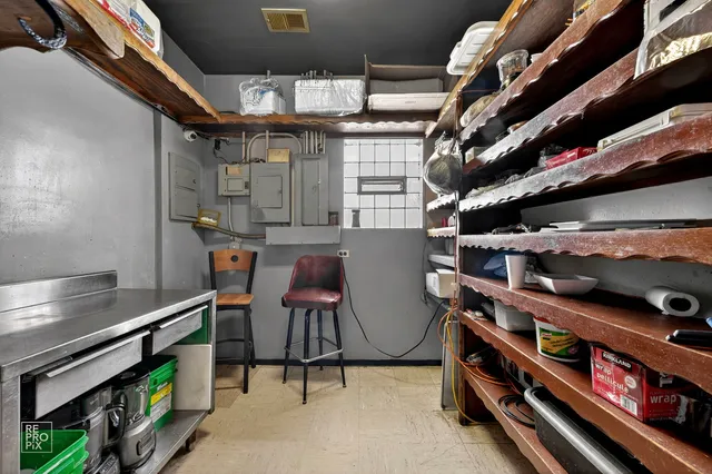 a view of a room with shelves
