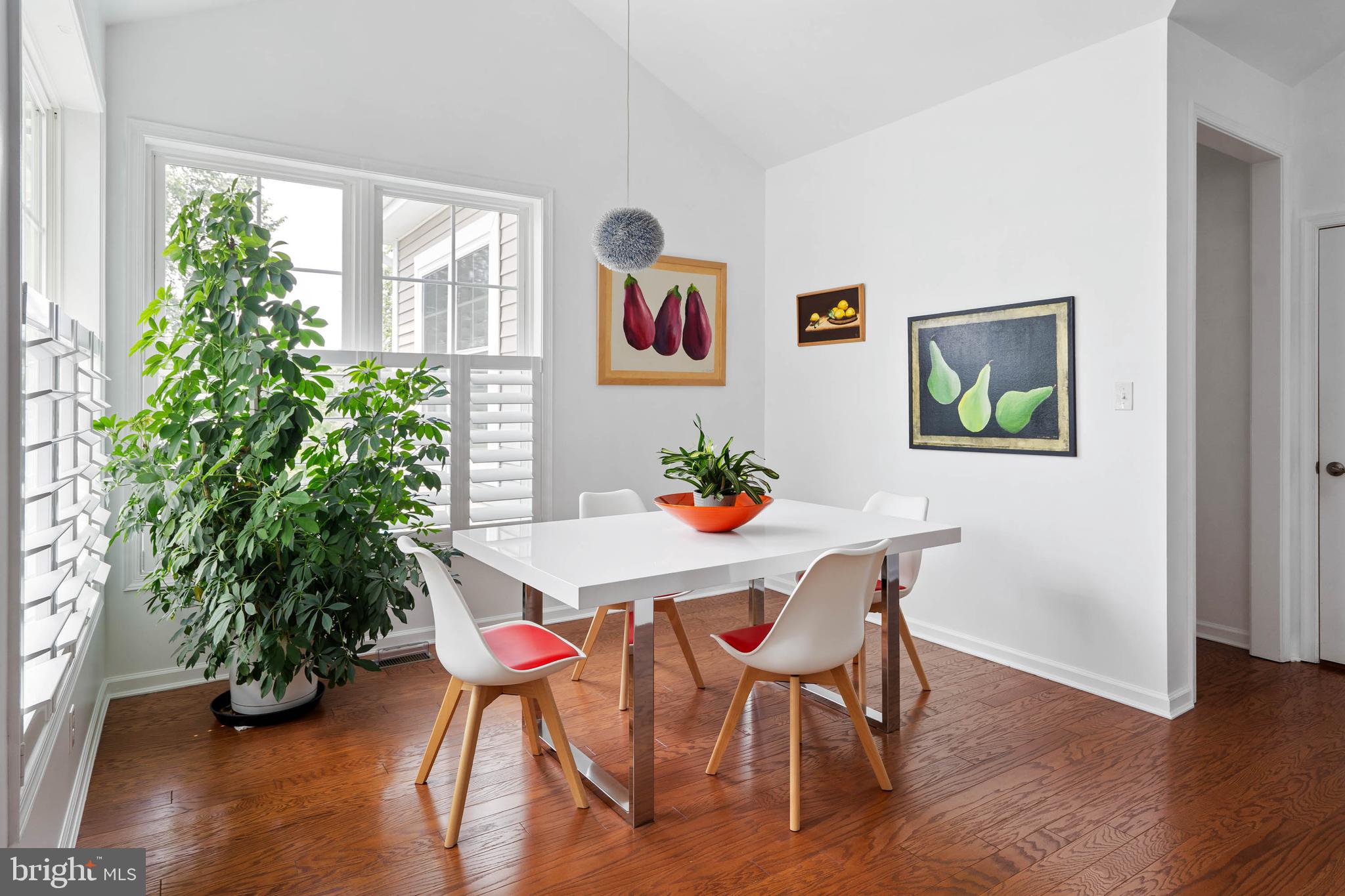 18923 Roth Drive Lewes, DE 19958 - Photo 20 of 73 a view of a dining room with furniture window and wooden floor