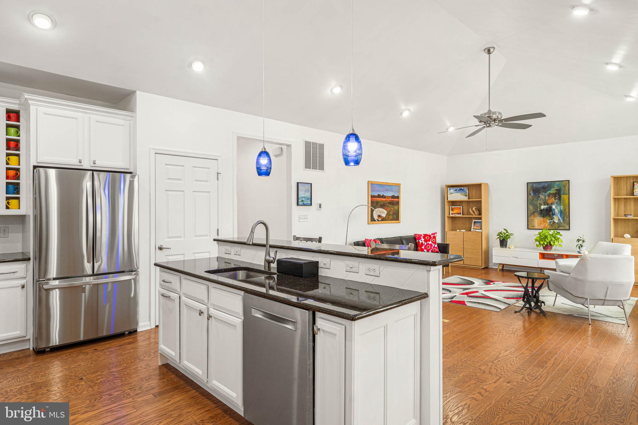 18923 Roth Drive Lewes, DE 19958 - Photo 24 of 73 a kitchen with stainless steel appliances granite countertop a sink stove and refrigerator