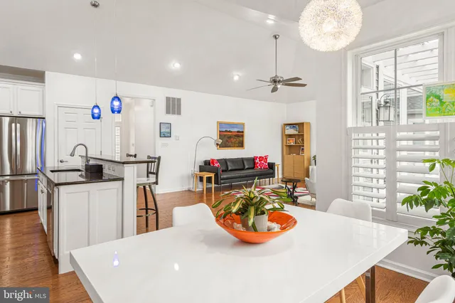 a sign that is on a brick wall