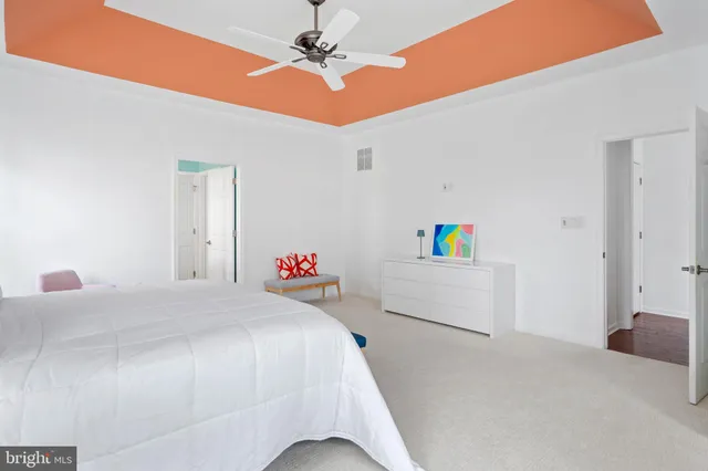 a work room with furniture and windows