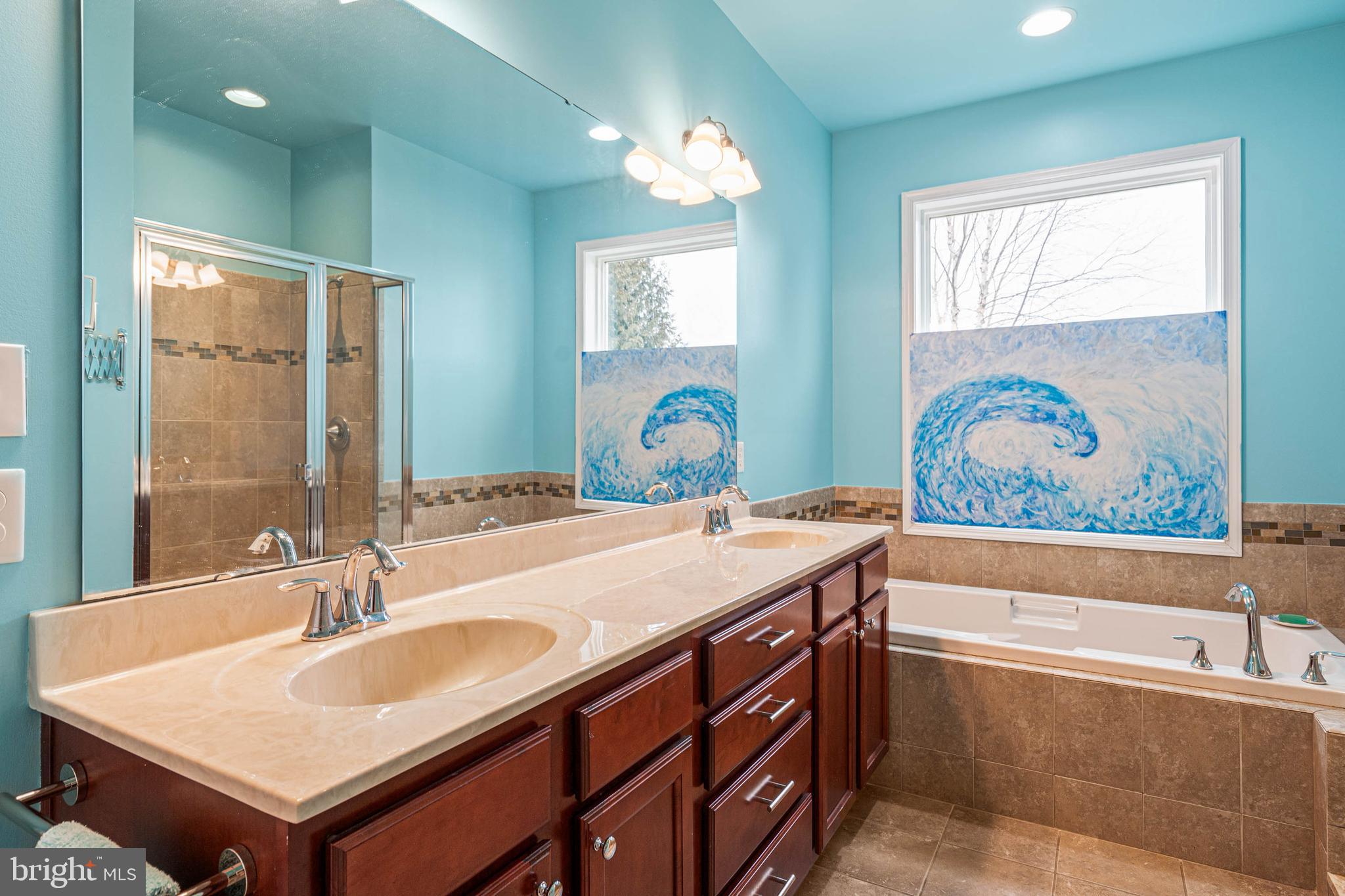 18923 Roth Drive Lewes, DE 19958 - Photo 34 of 73 a bathroom with a sink and a bathtub