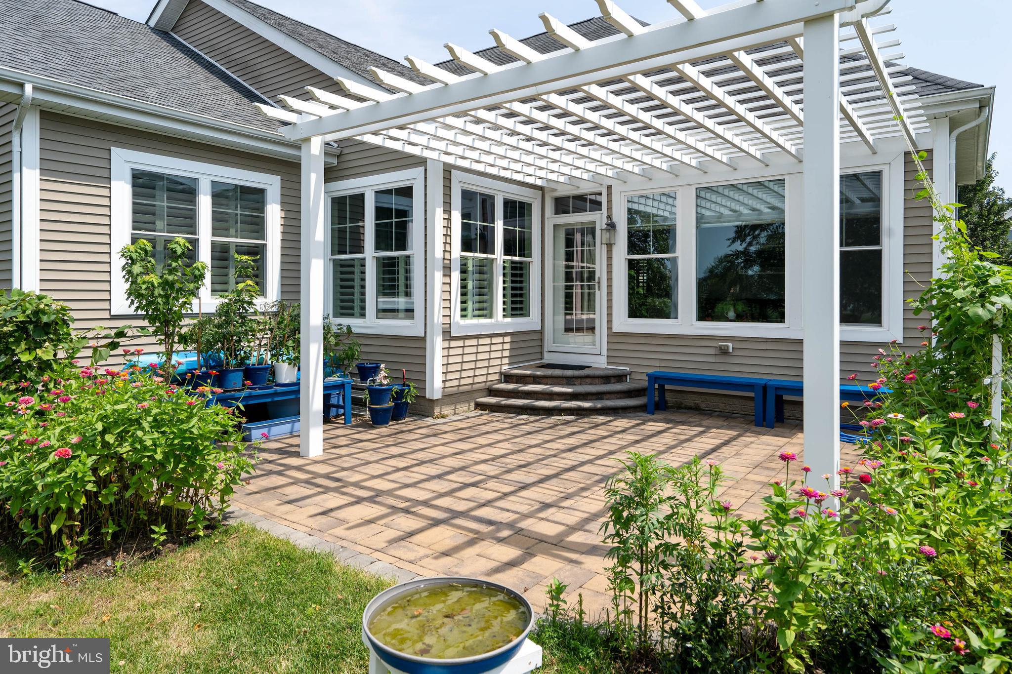 18923 Roth Drive Lewes, DE 19958 - Photo 6 of 73 a view of house with backyard and sitting area