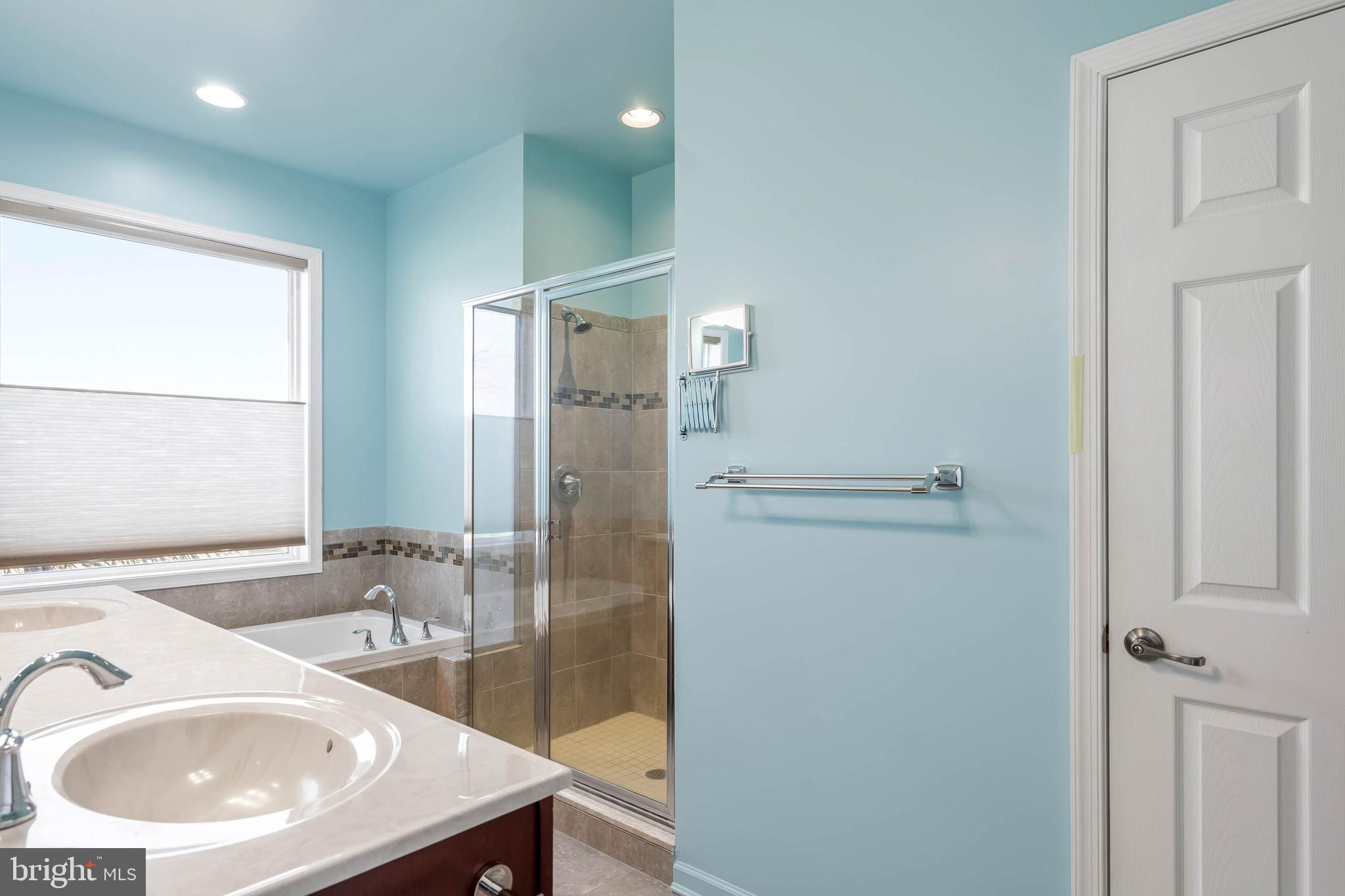 18923 Roth Drive Lewes, DE 19958 - Photo 66 of 73 a bathroom with a sink and a mirror