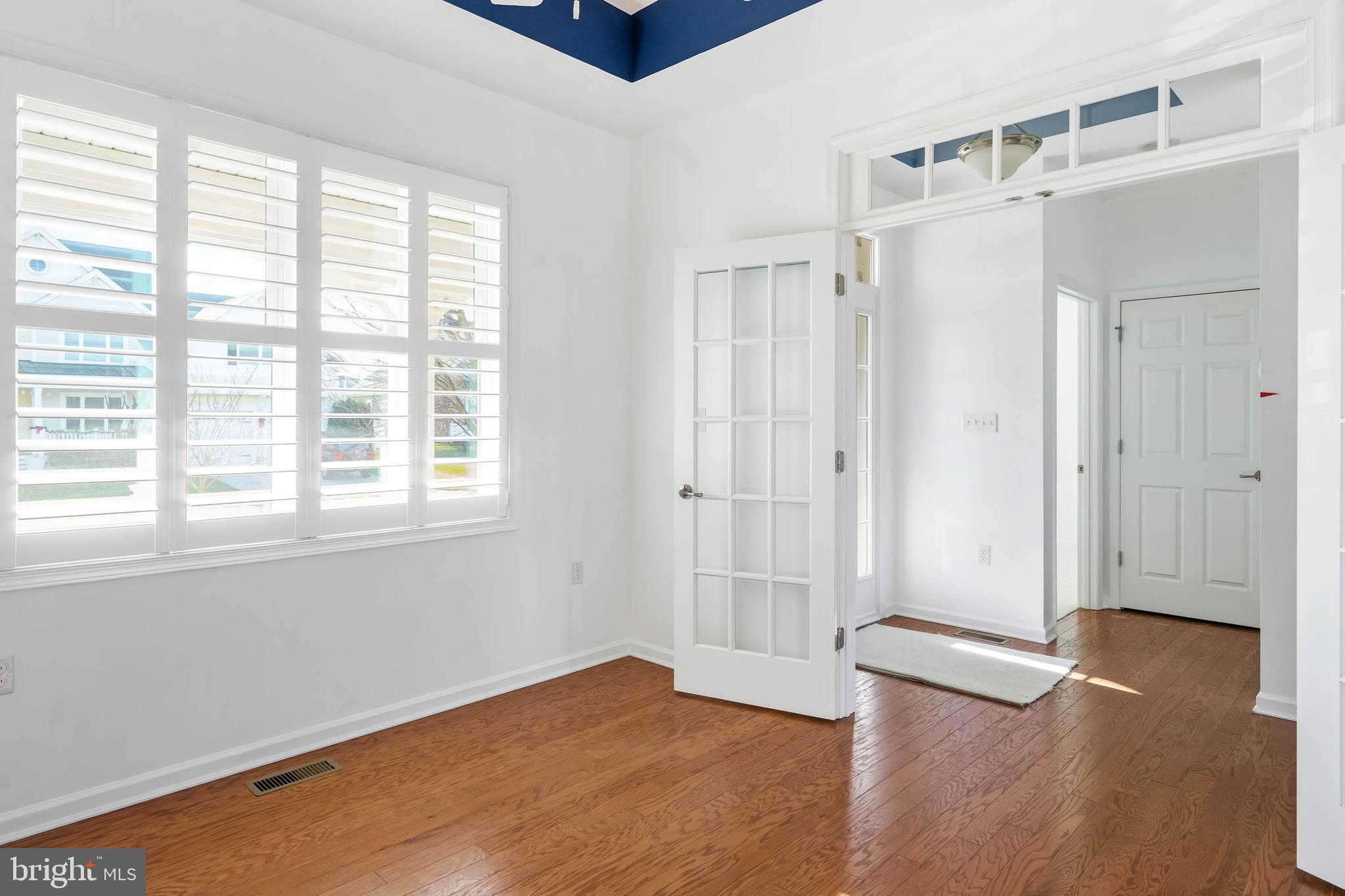 18923 Roth Drive Lewes, DE 19958 - Photo 73 of 73 a view of an empty room with wooden floor and a window