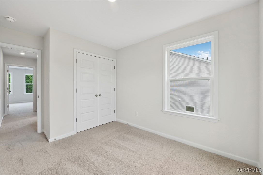 331 Mt Mccauley Way Aylett, VA 23009 - Photo 15 of 48 an empty room with windows and closet