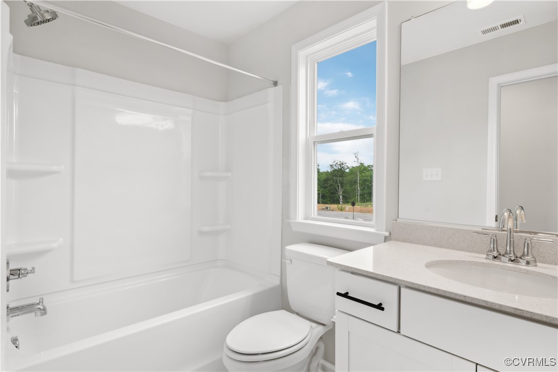 331 Mt Mccauley Way Aylett, VA 23009 - Photo 16 of 48 a bathroom with a granite countertop sink toilet tub and shower