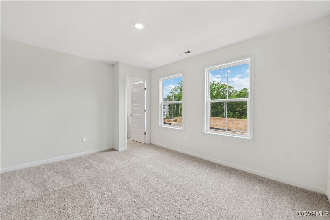 331 Mt Mccauley Way Aylett, VA 23009 - Photo 9 of 48 an empty room with windows