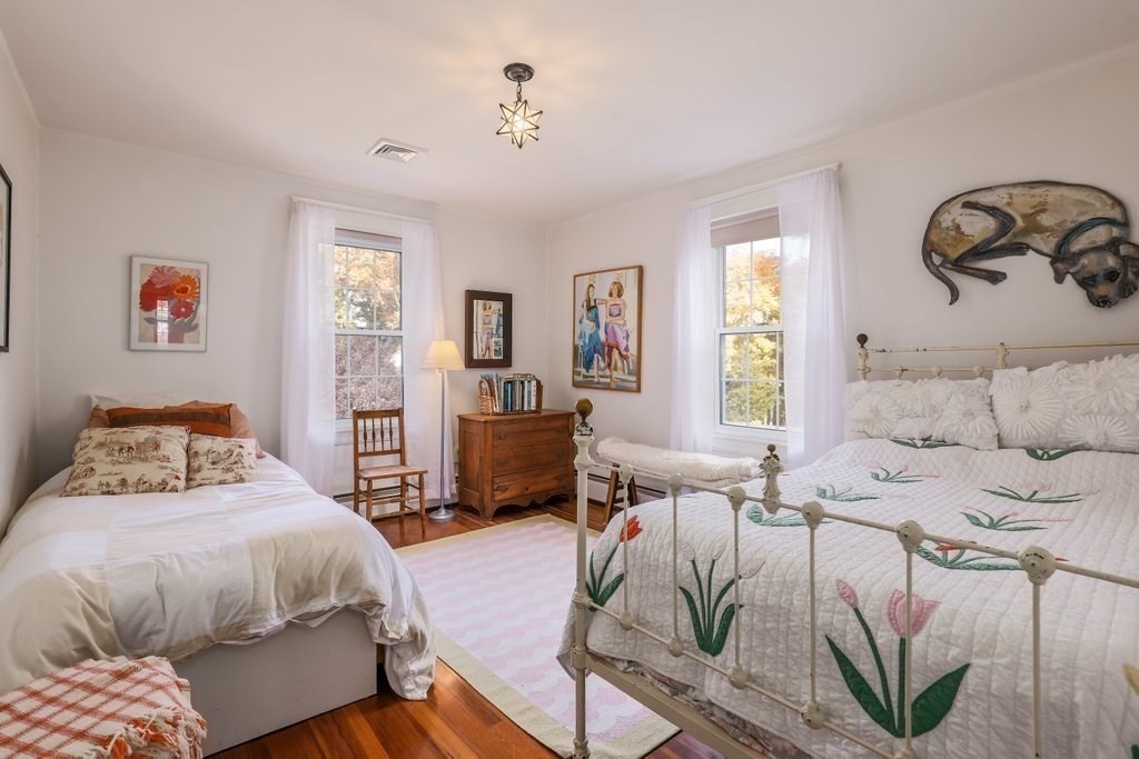 11 Ardlock Place Dudley, MA 01571 - Photo 12 of 42 a bedroom with a bed and wooden floor