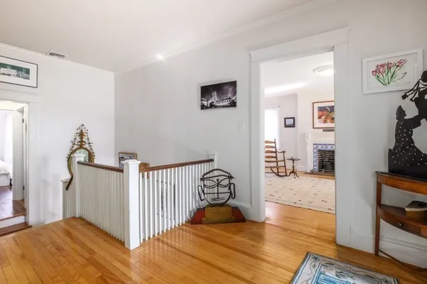 a bedroom with a bed and a view of bedroom