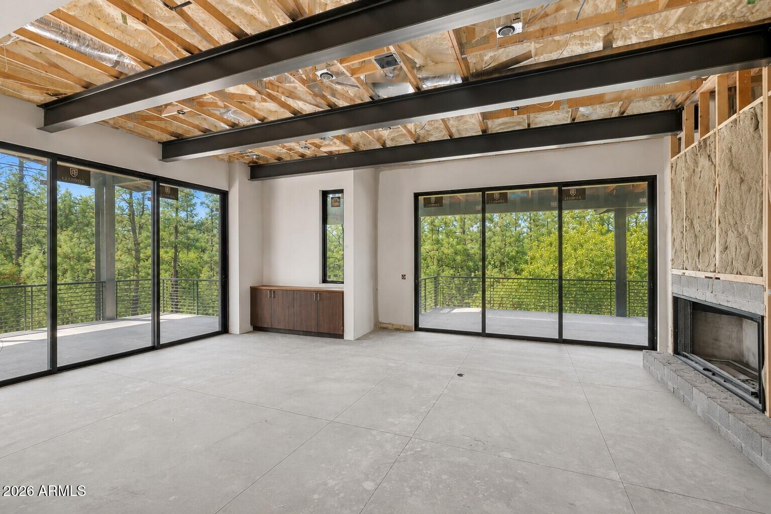 3002 East Game Trail Payson, AZ 85541 - Photo 2 of 40 a view of an empty room with windows