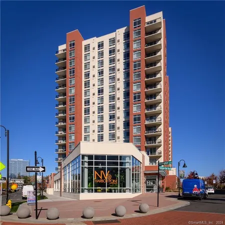 a front view of a building with a street