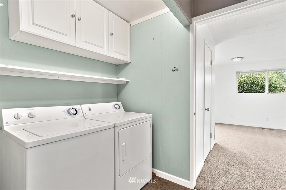 3407 Northeast 11th Street Renton, WA 98056 - Photo 17 of 27 a utility room with dryer and washer