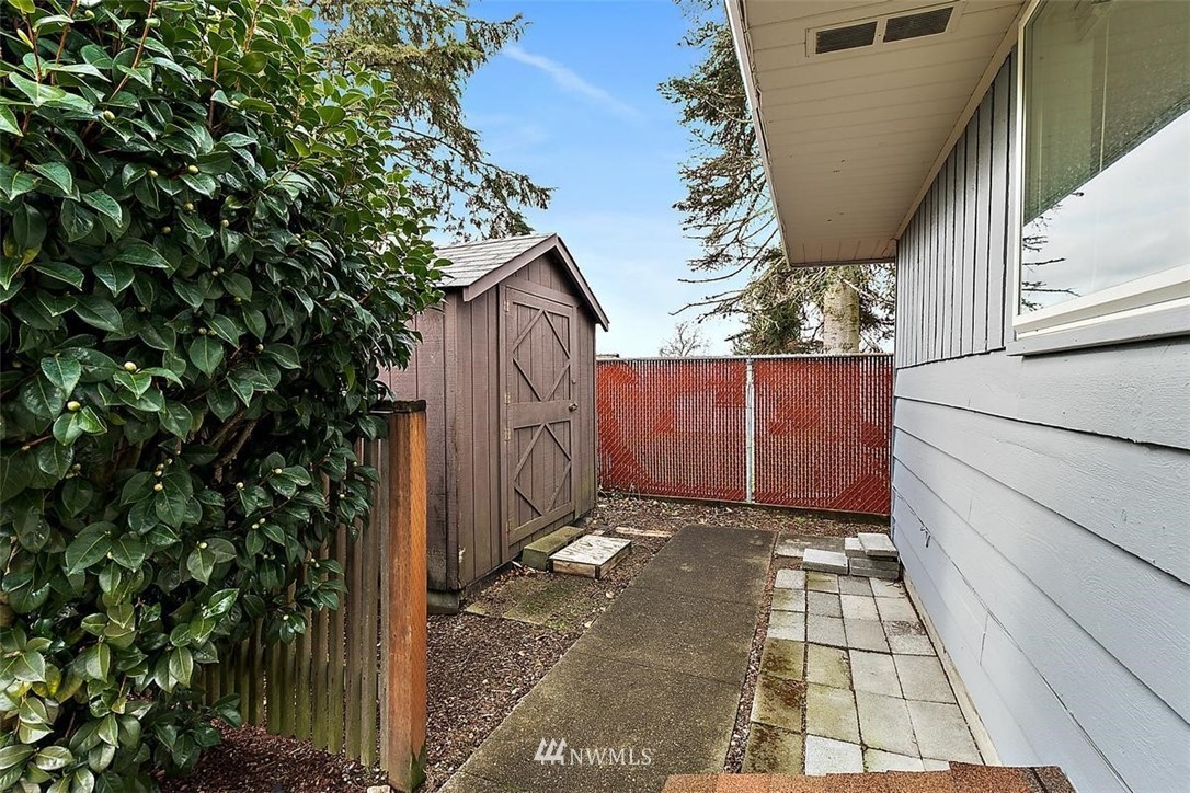 3407 Northeast 11th Street Renton, WA 98056 - Photo 23 of 27 a view of a house with a backyard