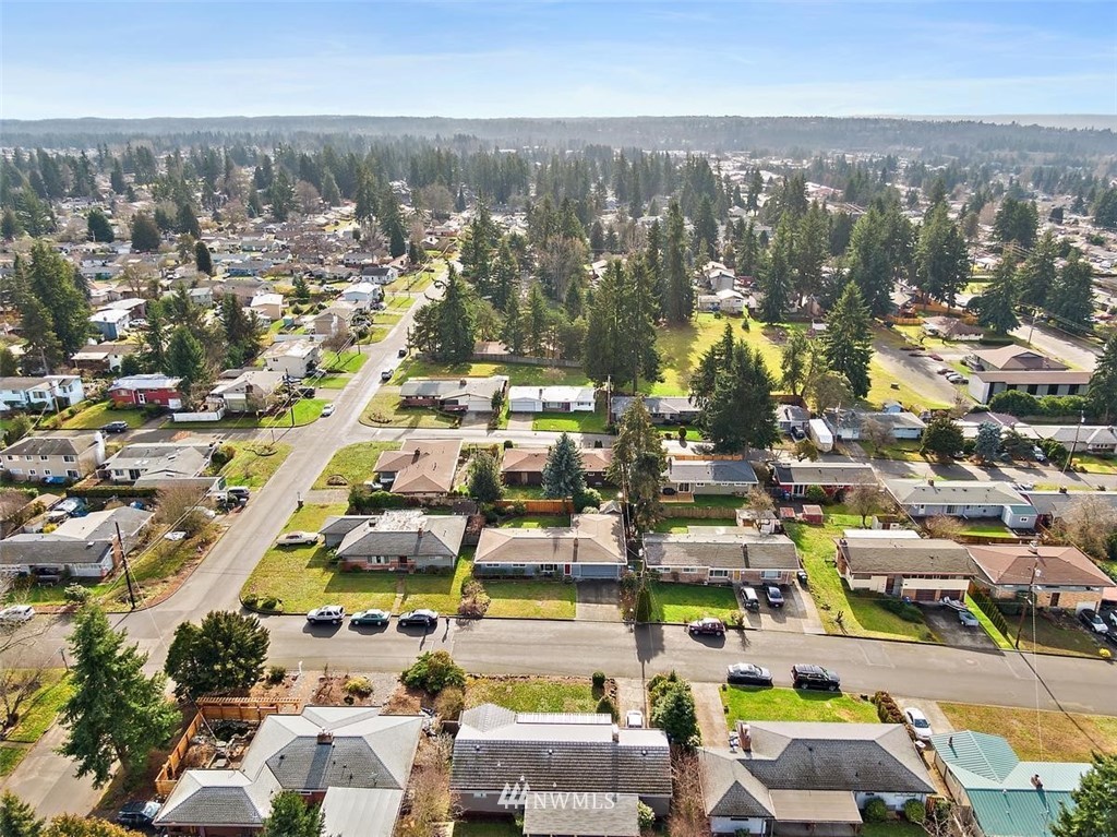 3407 Northeast 11th Street Renton, WA 98056 - Photo 25 of 27 an aerial view of residential houses with outdoor space