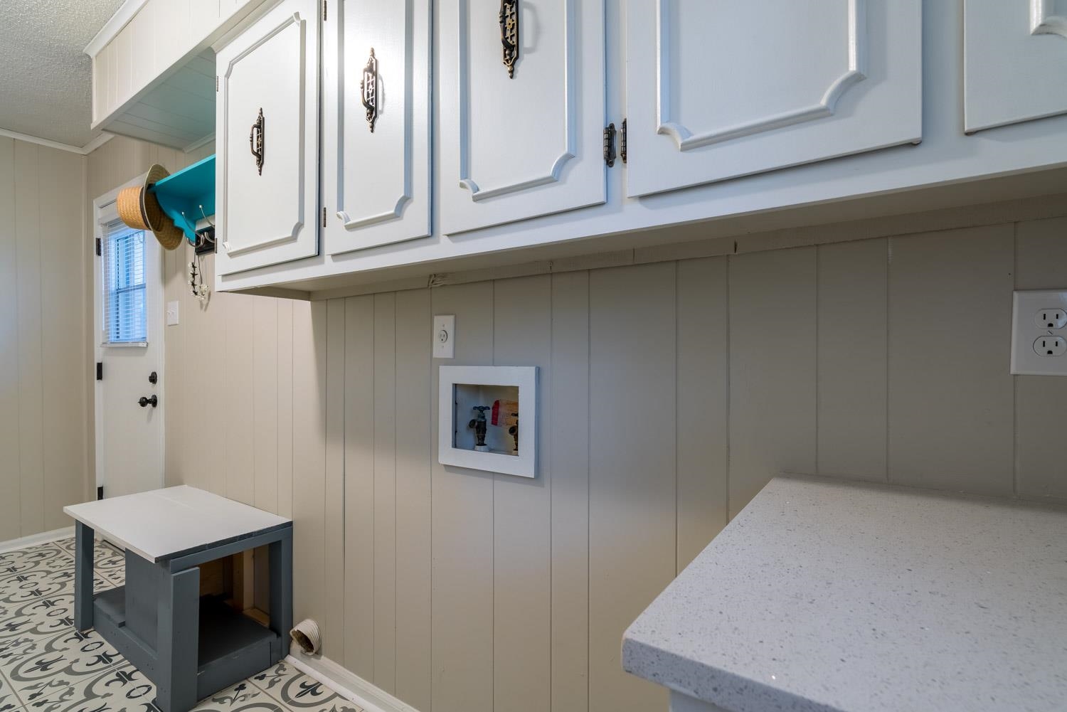 1854 Cherry Road Memphis, TN 38117 - Photo 21 of 25 a kitchen with stainless steel appliances white cabinets and a wooden floor