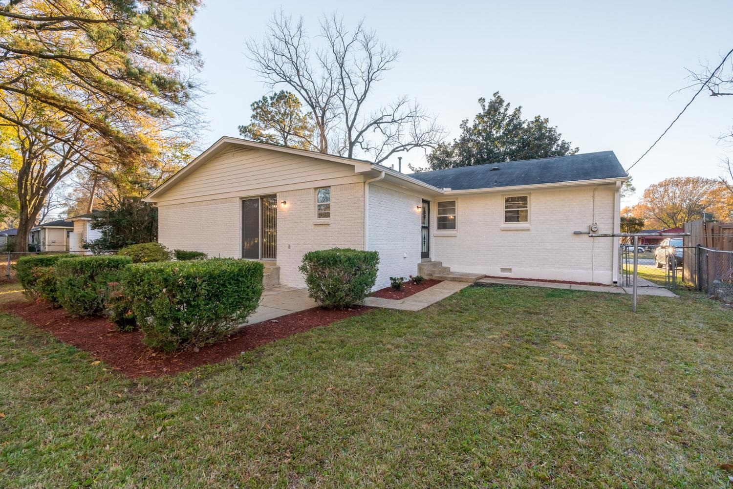 1854 Cherry Road Memphis, TN 38117 - Photo 24 of 25 a view of backyard of house with green space