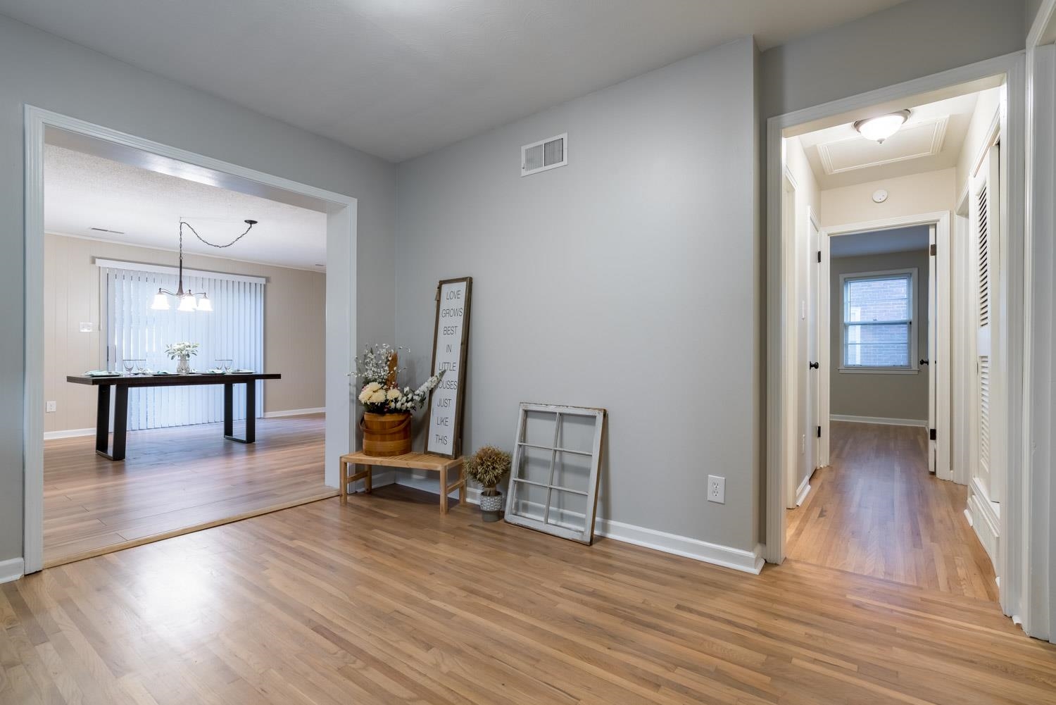 1854 Cherry Road Memphis, TN 38117 - Photo 7 of 25 a view of a livingroom with wooden floor and a workspace