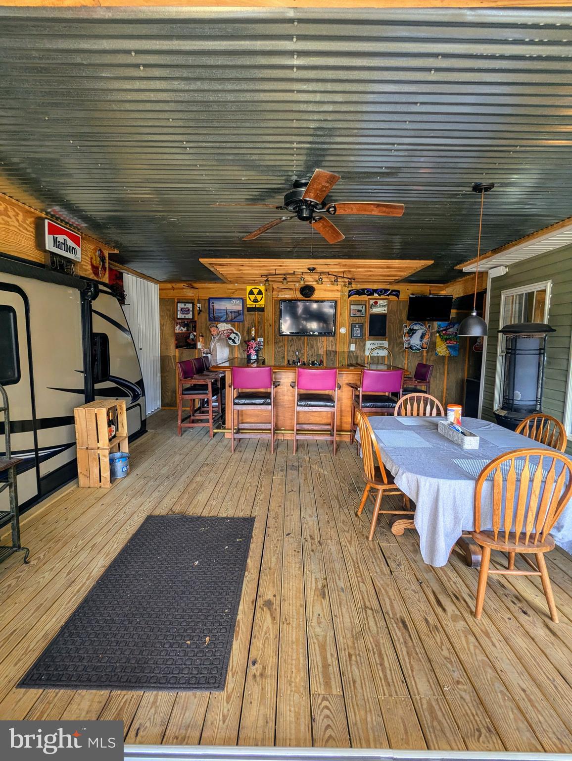 1 Detour Road Falling Waters, WV 25419 - Photo 22 of 36 a roof deck with table and chairs