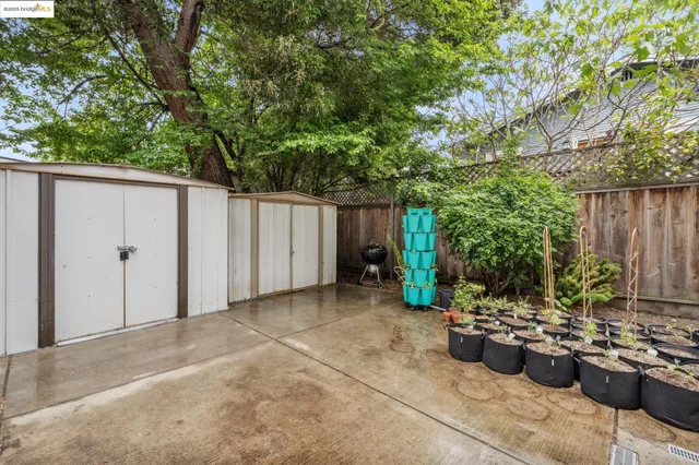 a view of a backyard with patio