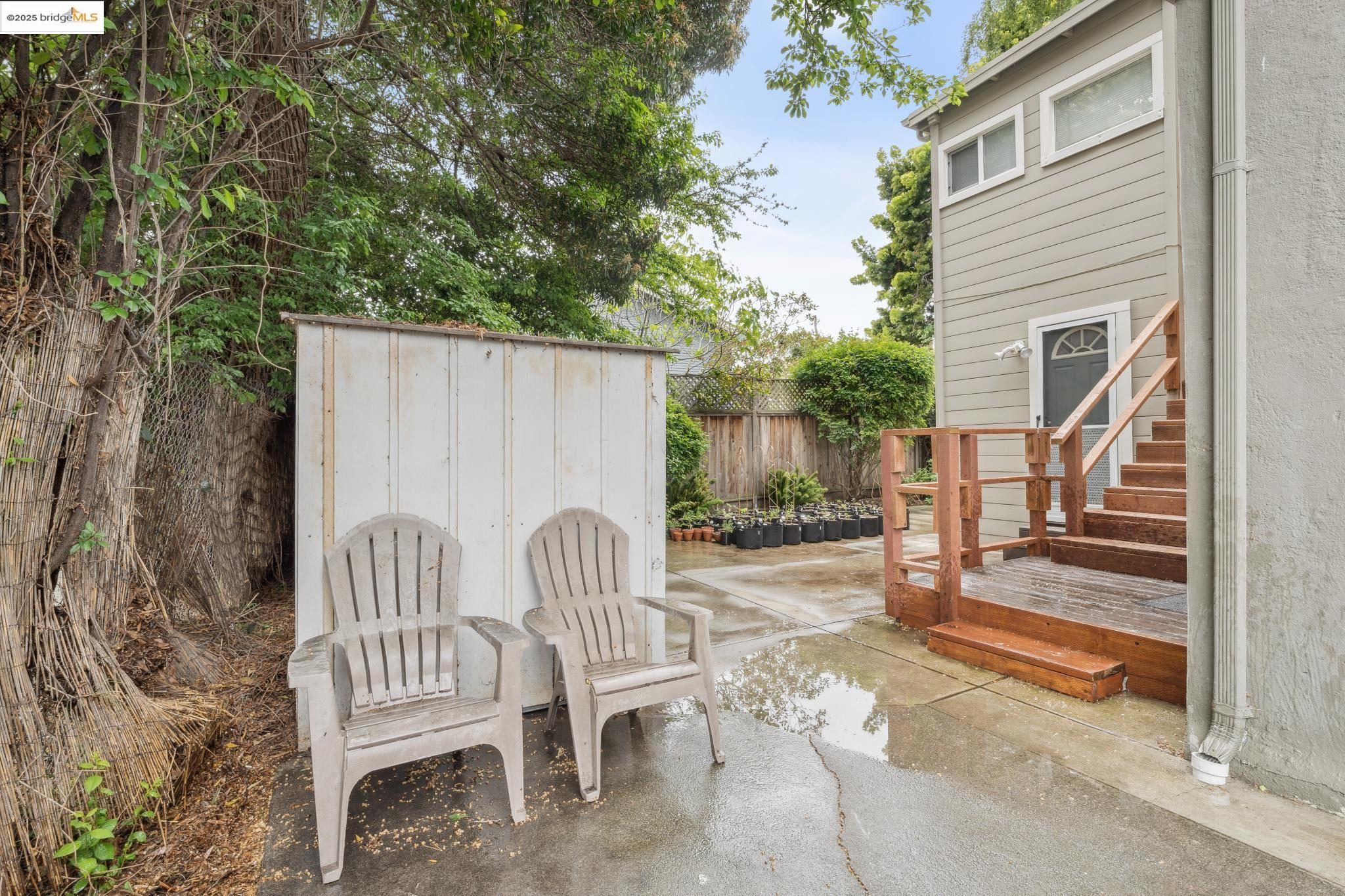 1226 Russell Street Berkeley, CA 94702 - Photo 31 of 32 a view of two chairs in the patio