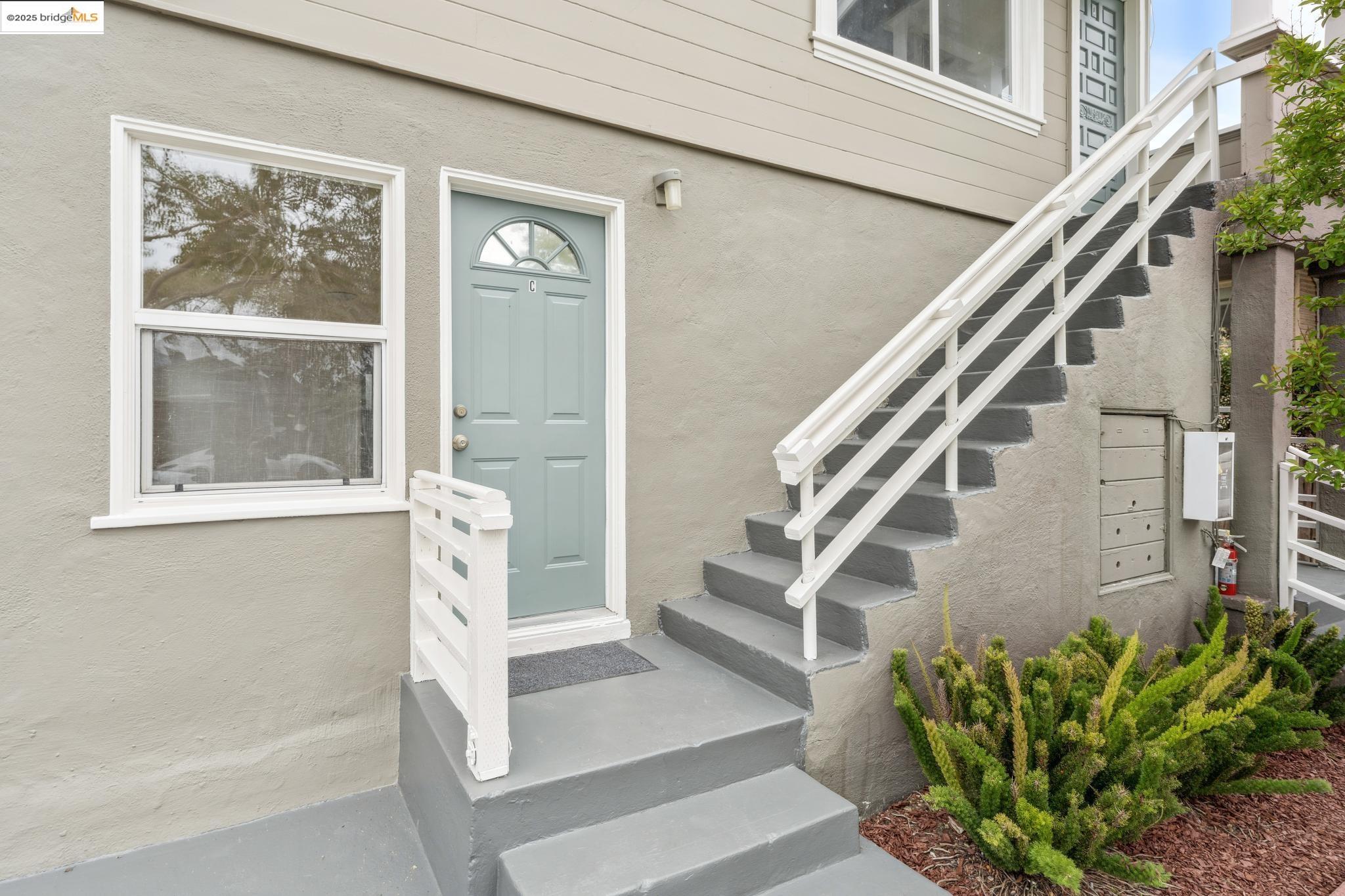 1226 Russell Street Berkeley, CA 94702 - Photo 32 of 32 a view of staircase with wooden floor and a potted plant