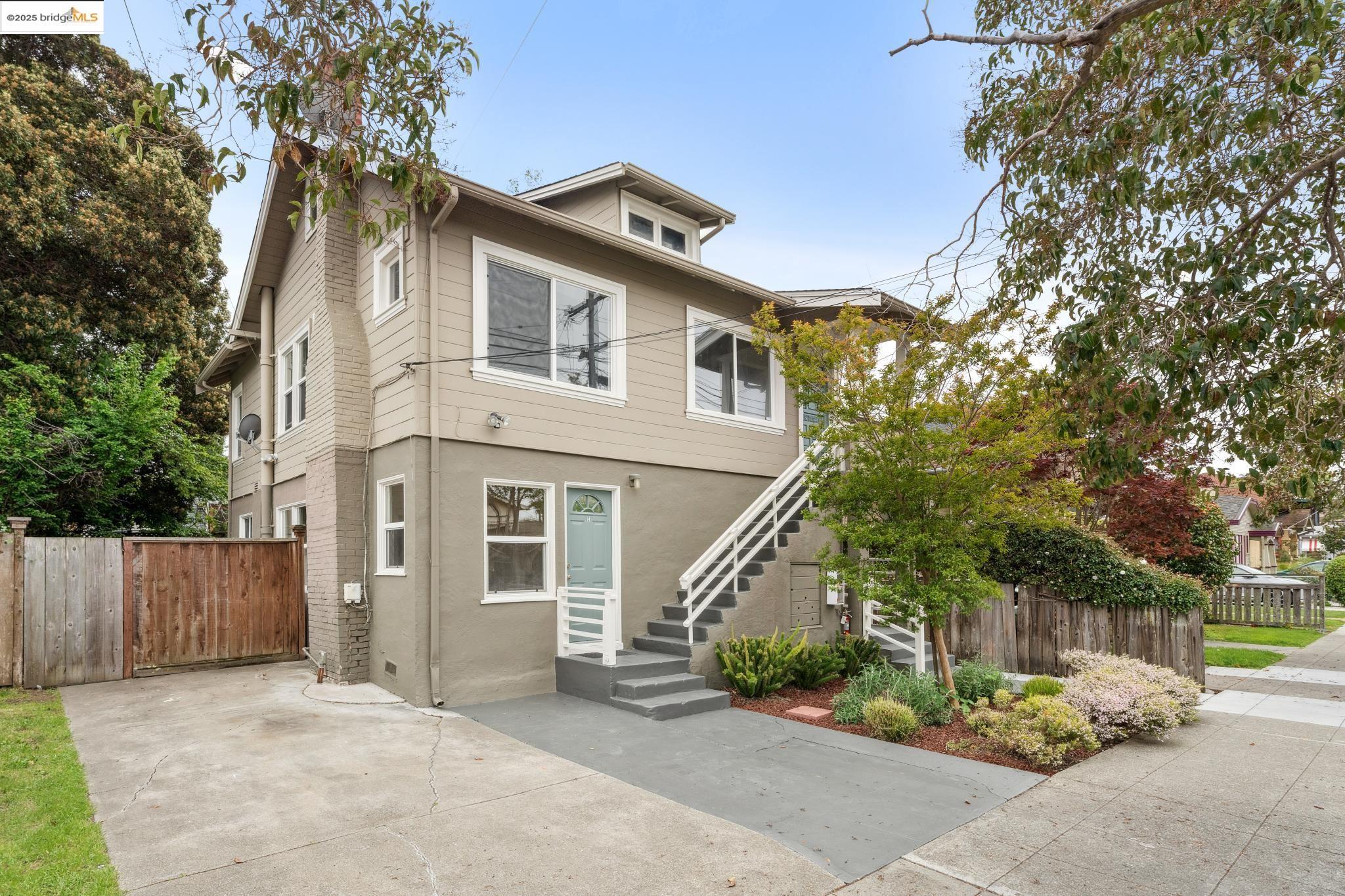 1226 Russell Street Berkeley, CA 94702 - Photo 5 of 32 a front view of a house with garden