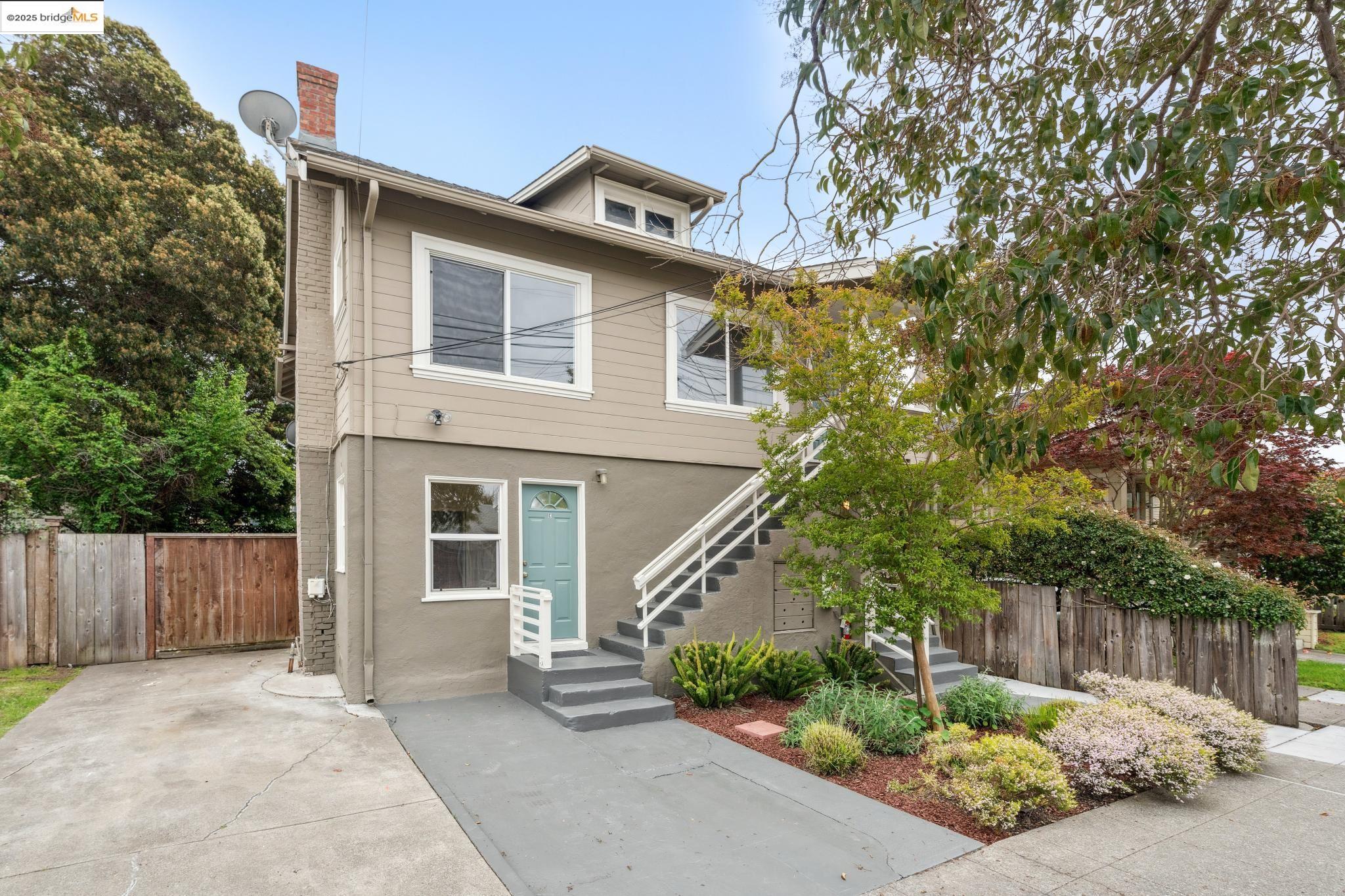 1226 Russell Street Berkeley, CA 94702 - Photo 6 of 32 front view of a house with a small yard