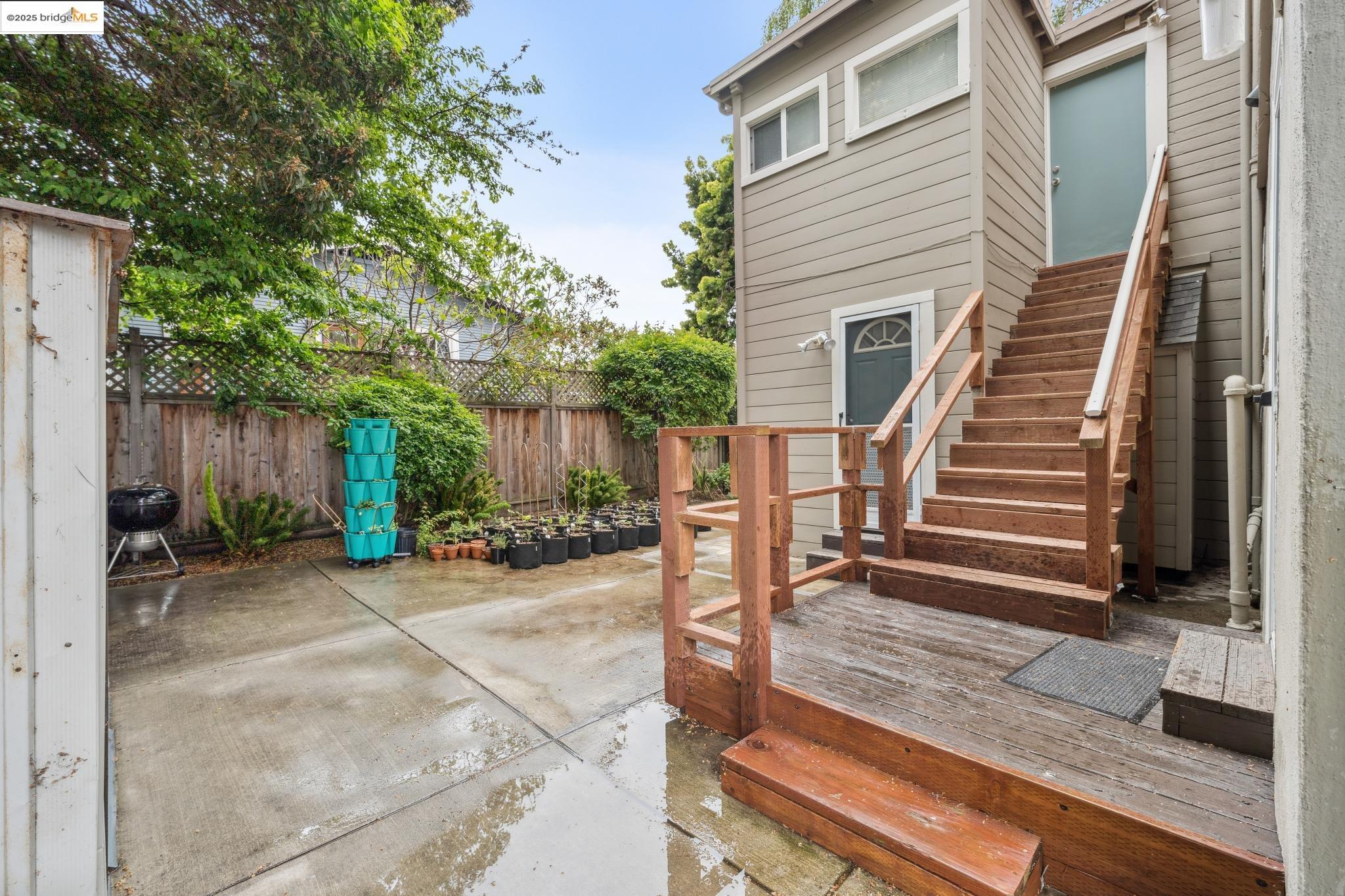 1226 Russell Street Berkeley, CA 94702 - Photo 7 of 32 a view of a house with backyard and wooden fence