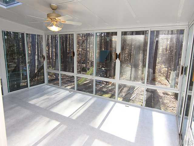 4311 Swarthmore Road Durham, NC 27707 - Photo 6 of 12 A sunroom for year-round enjoyment of nature. Sun Room