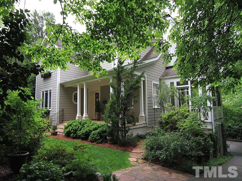 2327 Byrd Street Raleigh, NC 27608 - Photo 2 of 25 a front view of a house with a garden