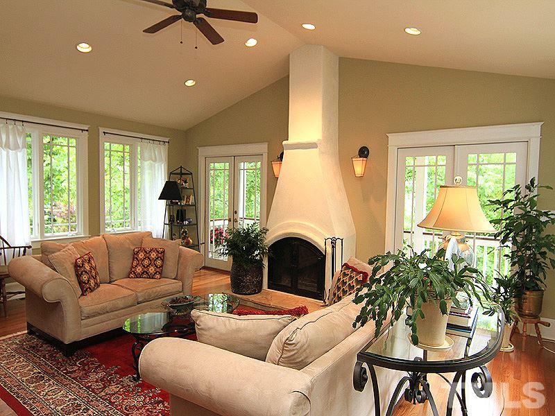 2327 Byrd Street Raleigh, NC 27608 - Photo 11 of 25 a living room with furniture fireplace and a large window