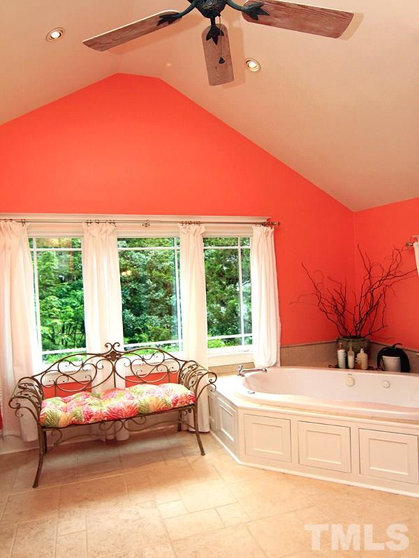 2327 Byrd Street Raleigh, NC 27608 - Photo 15 of 25 a bedroom with a bed and a large window
