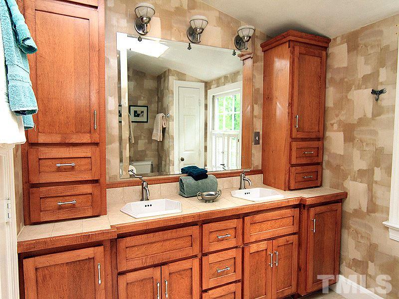2327 Byrd Street Raleigh, NC 27608 - Photo 17 of 25 a bathroom with a double vanity sink and a mirror