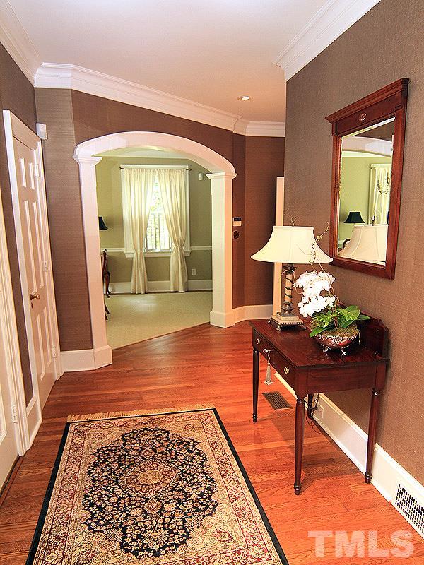 2327 Byrd Street Raleigh, NC 27608 - Photo 3 of 25 a living room with furniture and a rug