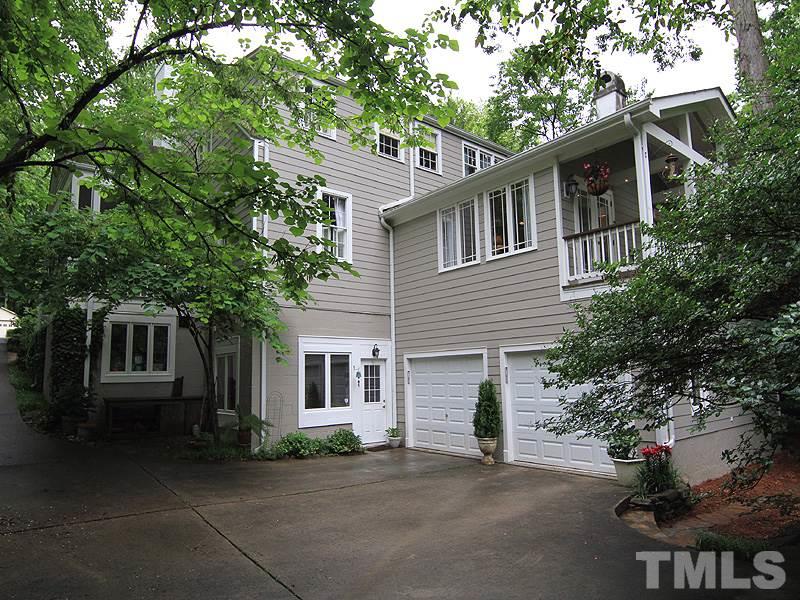 2327 Byrd Street Raleigh, NC 27608 - Photo 25 of 25 a front view of a house with a garden