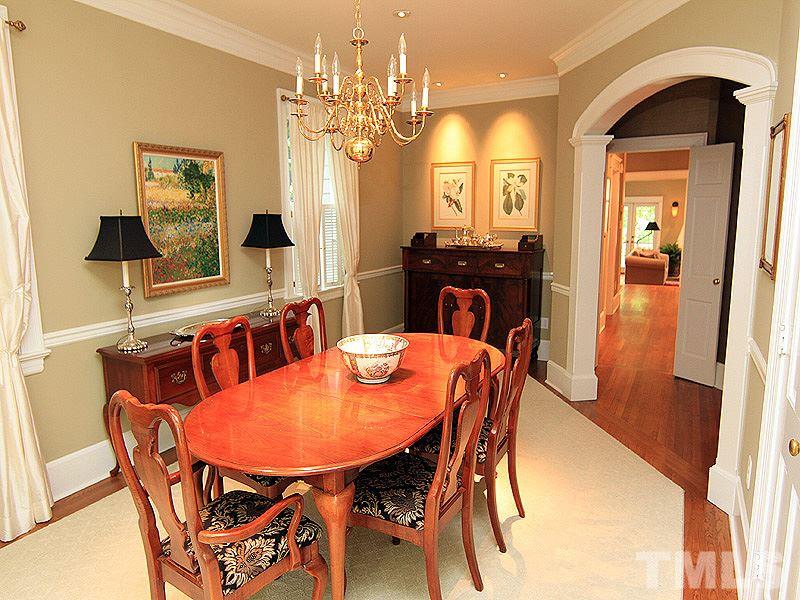 2327 Byrd Street Raleigh, NC 27608 - Photo 4 of 25 a view of a dining room with furniture and a chandelier