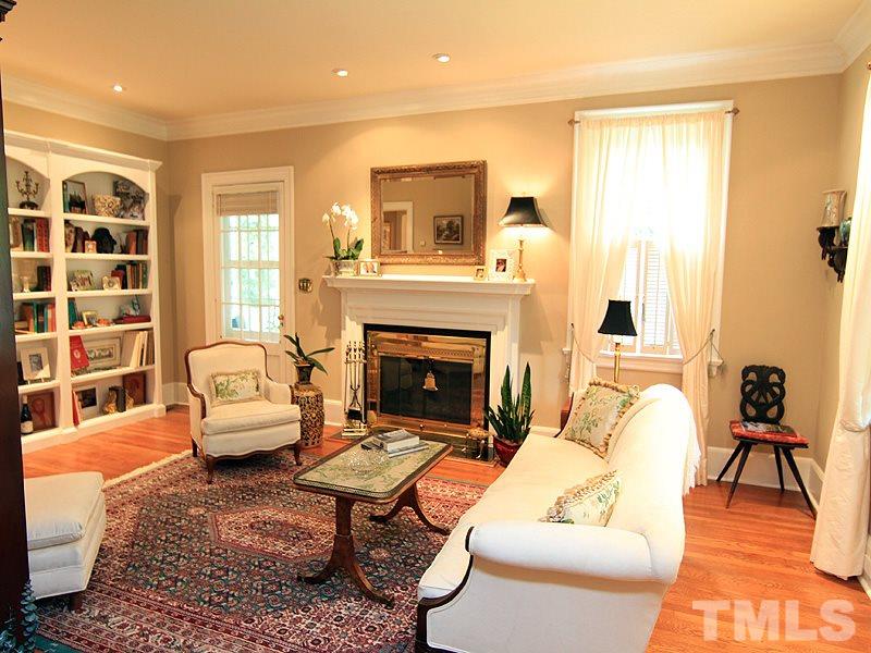 2327 Byrd Street Raleigh, NC 27608 - Photo 5 of 25 a living room with furniture and a fireplace