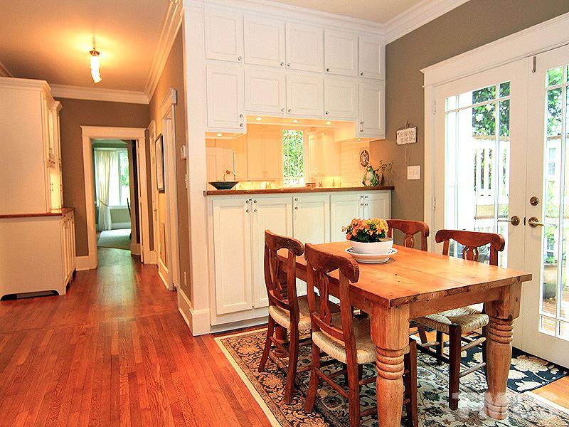 2327 Byrd Street Raleigh, NC 27608 - Photo 10 of 25 a view of a dining room with furniture window and wooden floor