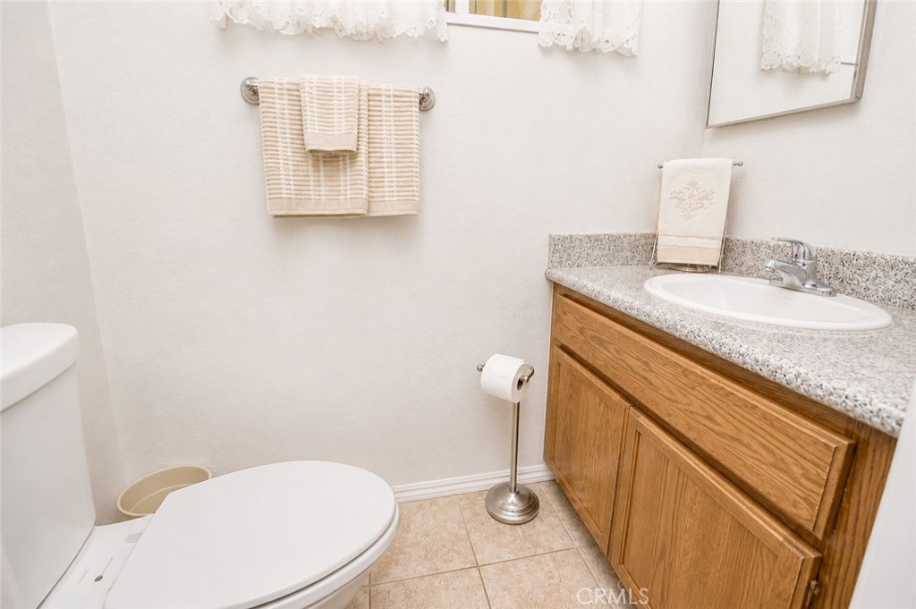 2030 Wayside Street Compton, CA 90222 - Photo 9 of 25 illiterate how the look and feel of the bathroom can change with a new paint.