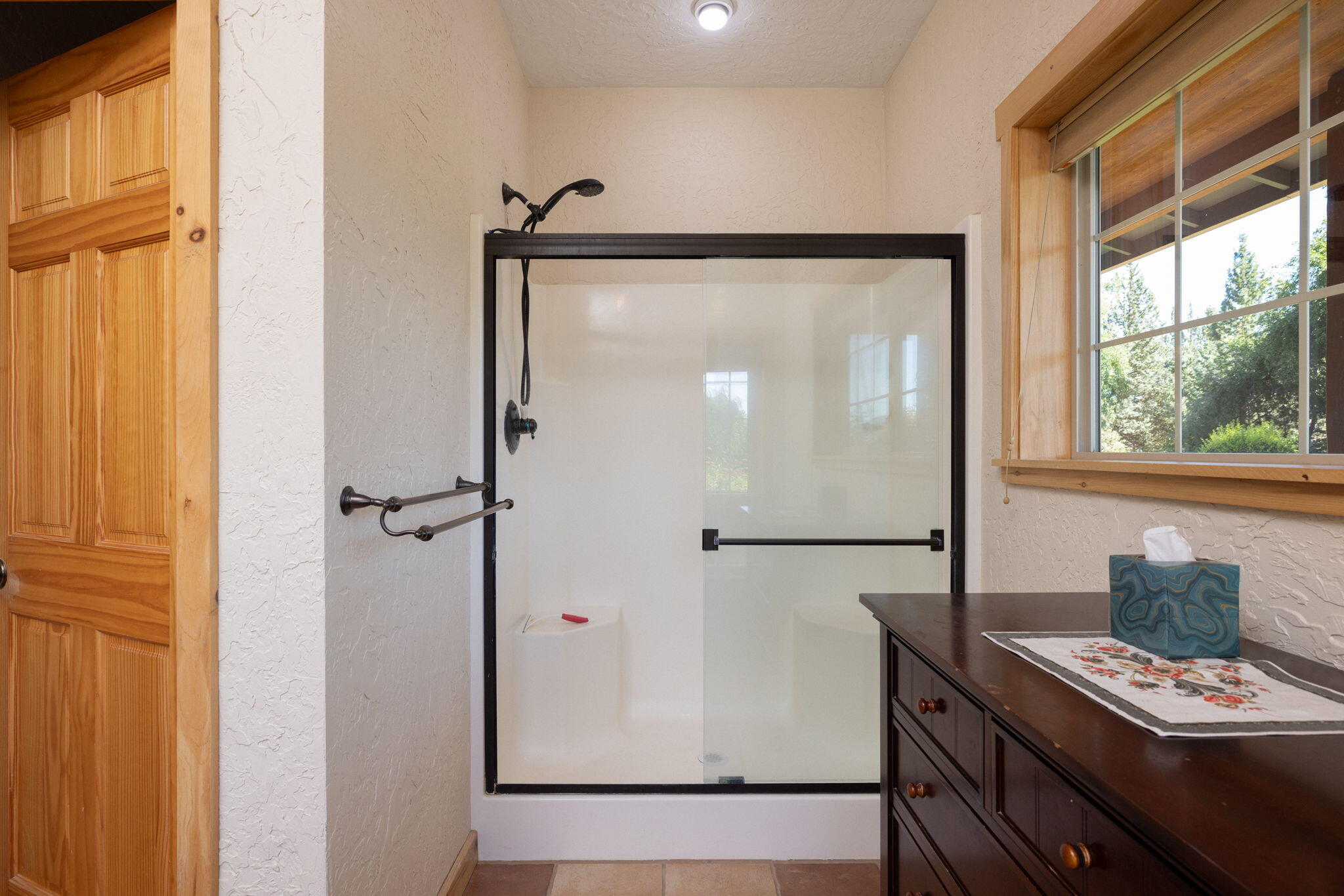 11311 Fleming Road Powell Butte, OR 97753 - Photo 27 of 58 primary bath with fiberglass shower
