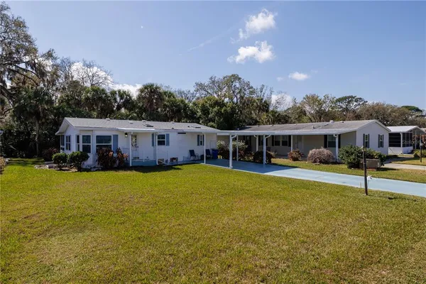 a front view of a house with swimming pool