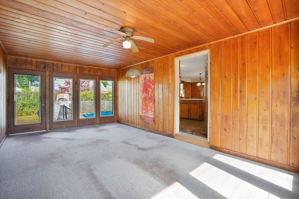 38 Dillon Street Chicopee, MA 01013 - Photo 4 of 19 a view of an empty room with a sliding door