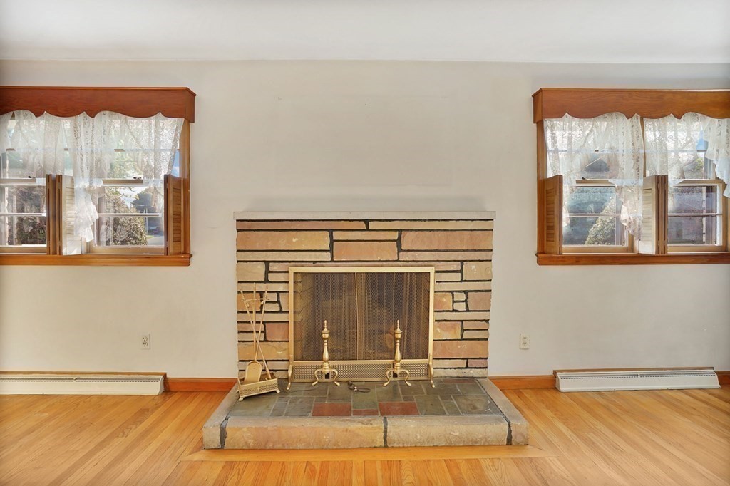38 Dillon Street Chicopee, MA 01013 - Photo 9 of 19 a view of a fireplace in a room