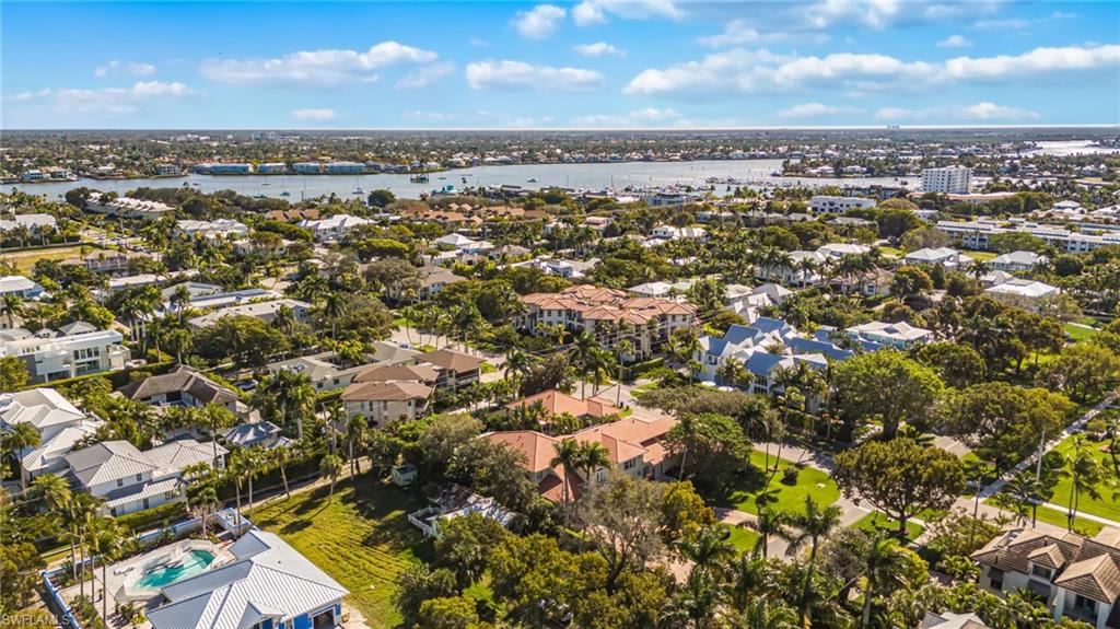 611 10th Avenue South, Unit B2 Naples, FL 34102 - Photo 27 of 27 Aerial overview of property's location with nearby suburban area