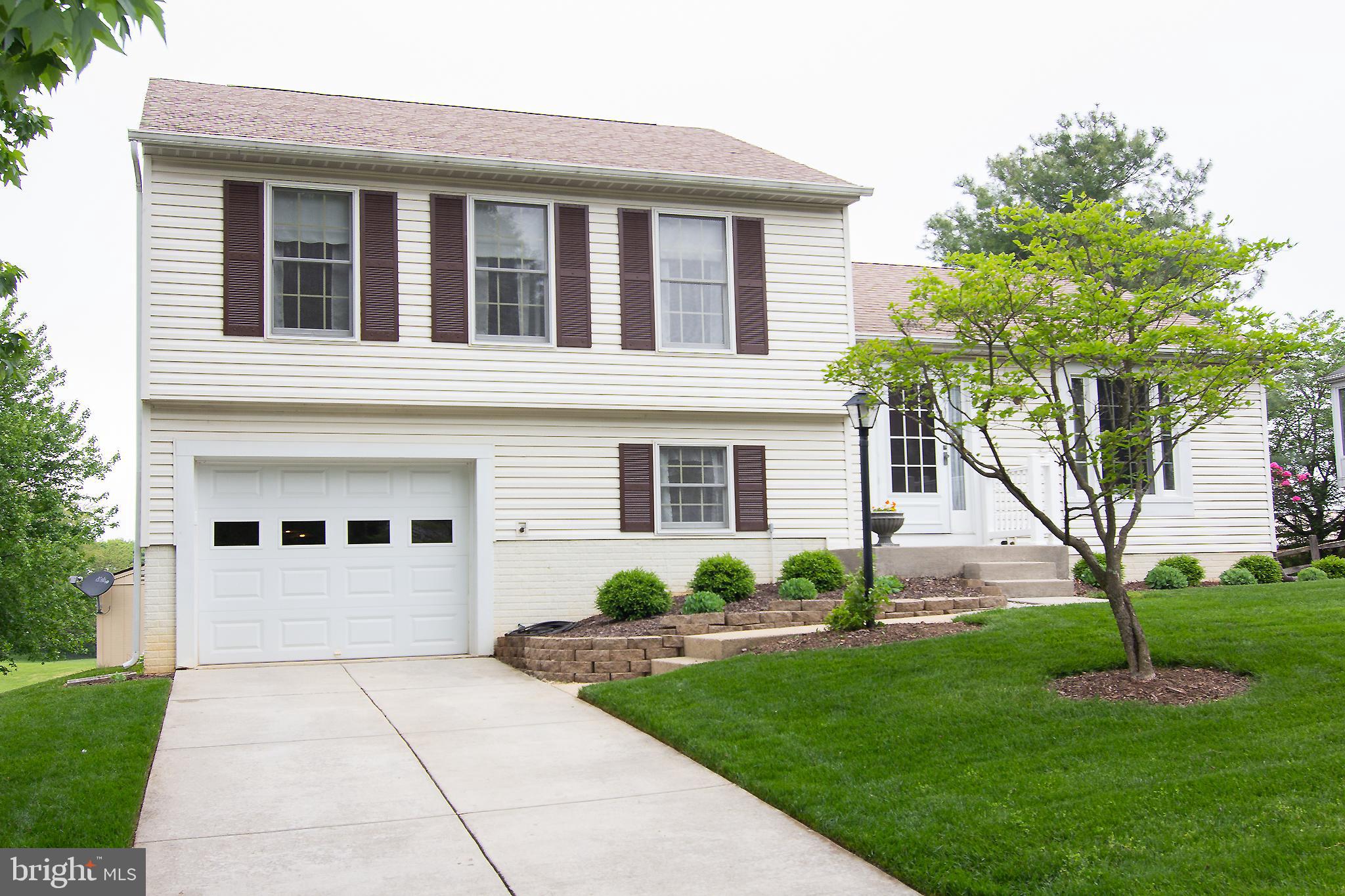 6683 Slacks Road Eldersburg, MD 21784 - Photo 1 of 37 Concrete driveway w/garage